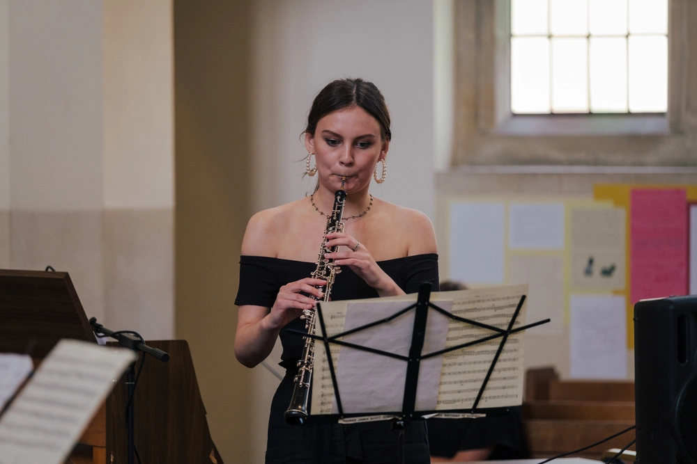 Student playing the clarinet during a Bristol Pre-Con session